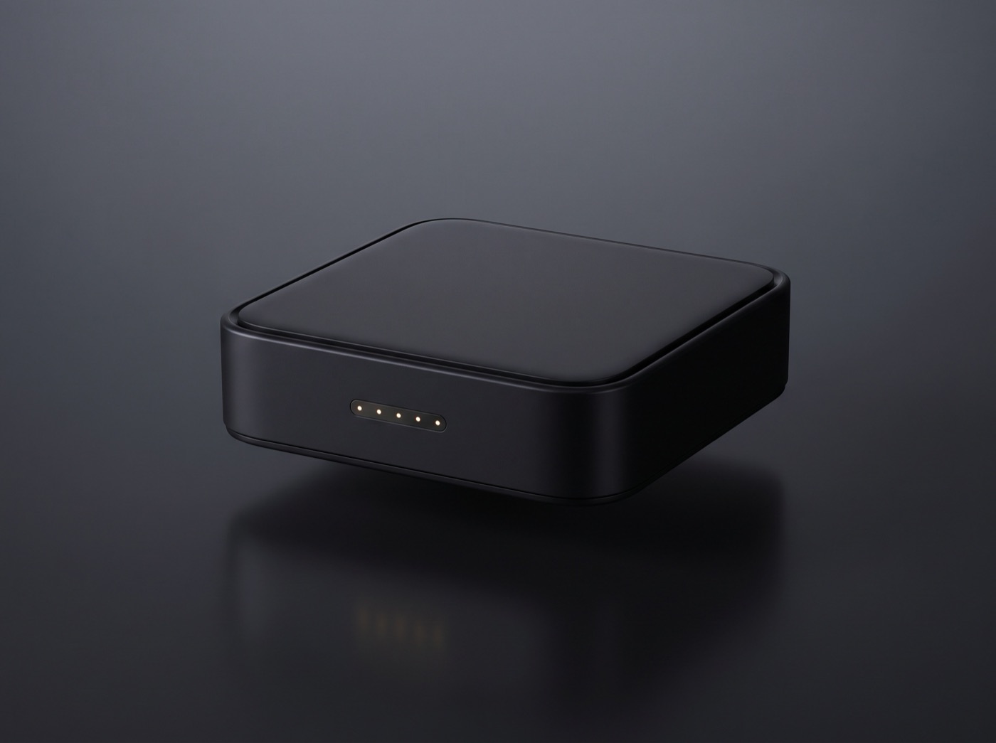 A sleek matte black server module with a row of warm gold indicator lights